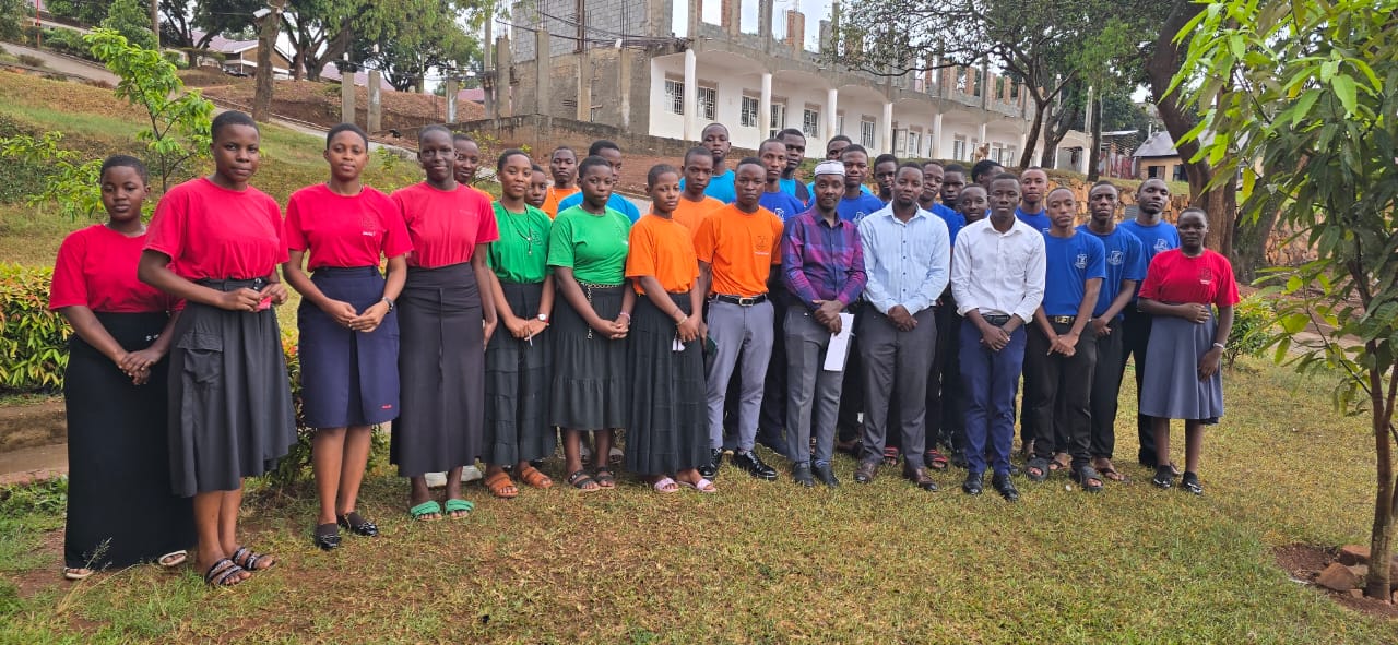 YCBN leadership ethics outreach with student leaders at St. Charles Lwanga Secondary School in Kibiri